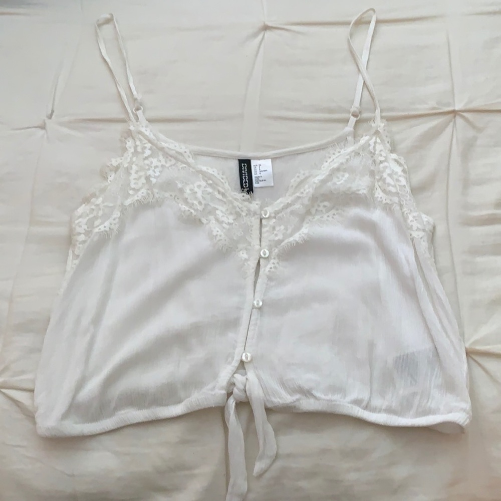 Cropped tie front lace top